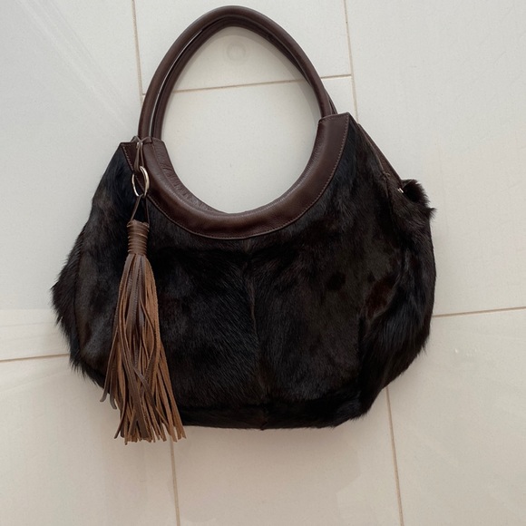 Handbags - Brown leather and fur purse